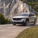 2026 Mazda CX-50 Hybrid in motion on the road