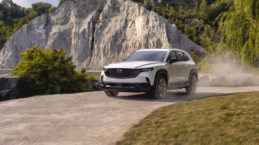 2026 Mazda CX-50 Hybrid in motion on the road