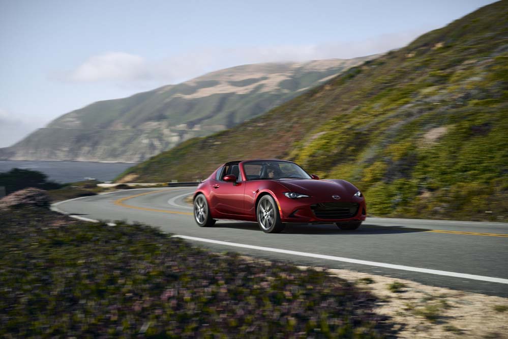2026 Mazda MX-5 Miata driving near the coast